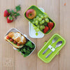 Gorgeous food photography: eSeasons Bento Lunchbox in Green with appetizing lunch including salad, fruit, strawberry & sandwich